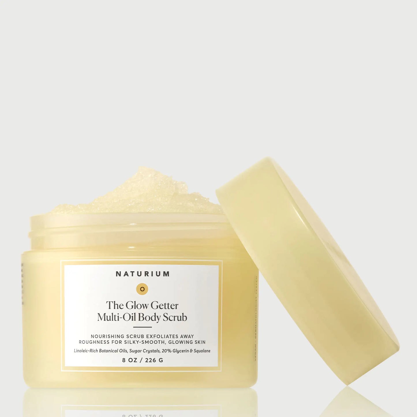 the-glow-getter-multi-oil-body-scrub-t8 NATR-40028-GlowGetter-Multi-Oil-Body-Scrub-Front-CapOff-bonebkgd.webp