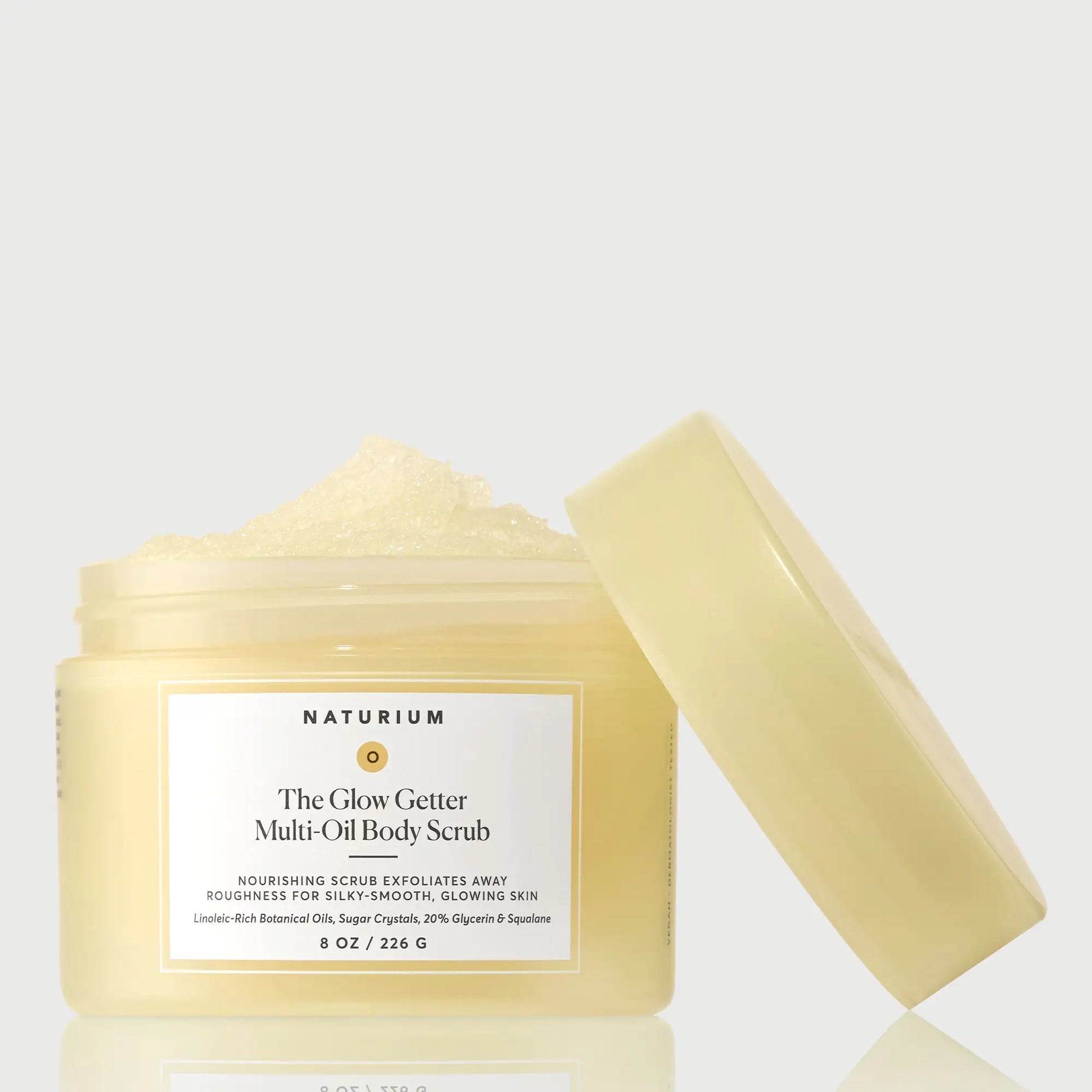the-glow-getter-multi-oil-body-scrub-t8 NATR-40028-GlowGetter-Multi-Oil-Body-Scrub-Front-CapOff-bonebkgd.webp