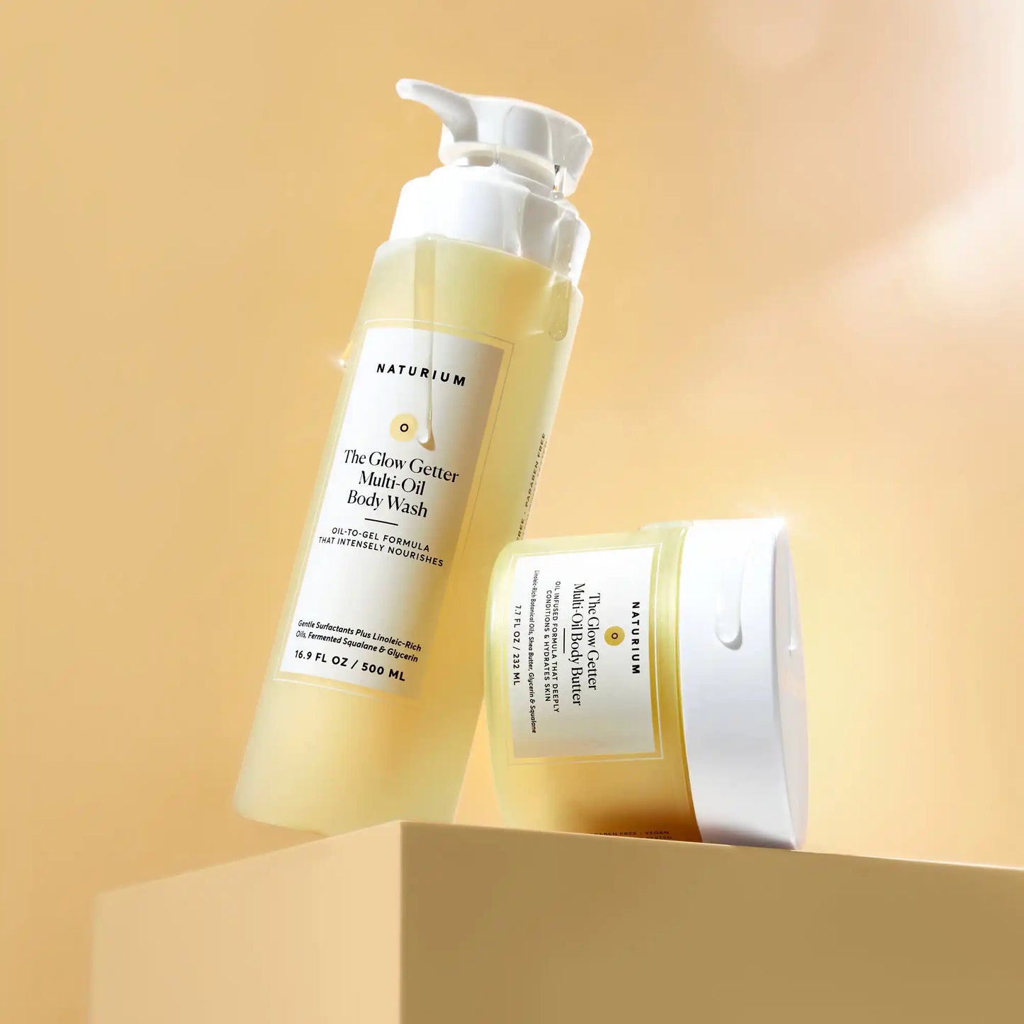 the-glow-all-out-body-bundle-m4 gg-bodybutter_1464-crop_revcolor_FL.webp